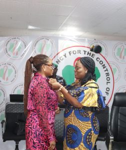 The DG NACA Dr Temitope Ilori and PMG NIPOST Ms. Tola Odeyemi